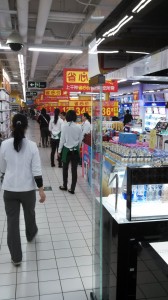 Women standing in Walmart, waiting on customers to assist