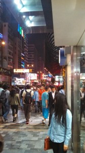 Random snapshot of foot traffic alongside Nathan Road in Hong Kong. This was around 8:00 PM on a Saturday evening.