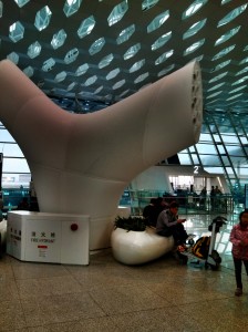This is a vent, and they are all over the airport. I think Shenzhen missed a great opportunity, though. They could have made them giant red capped mushrooms with white spots.